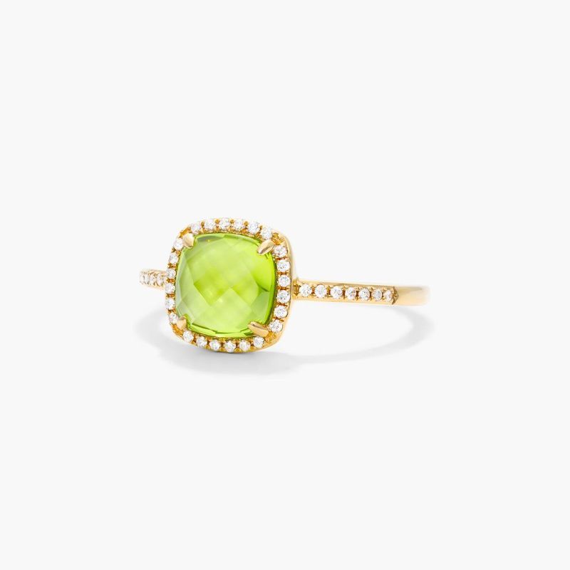 peridot ring in yellow gold setting