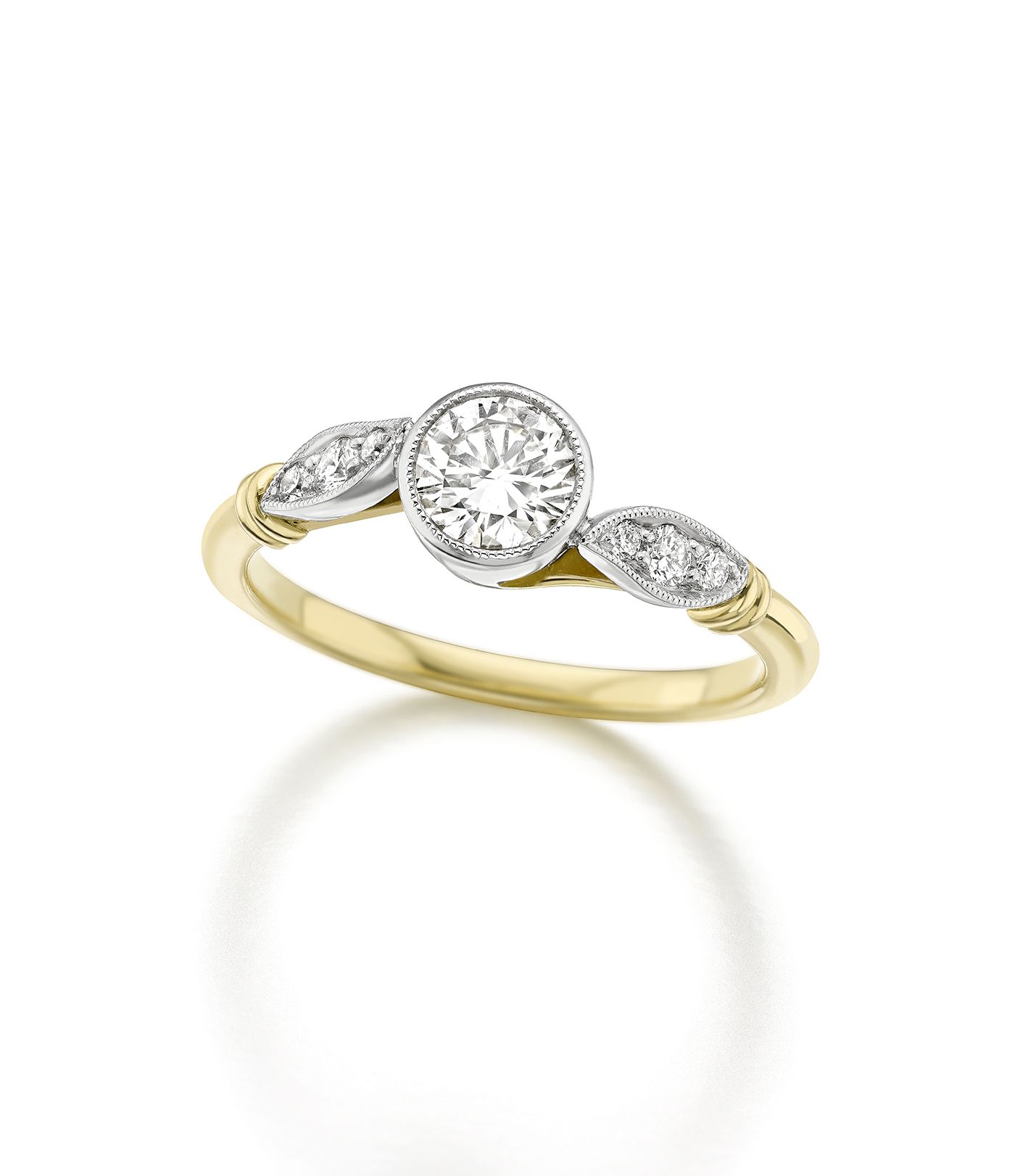 round cut diamond with milgrain engagaement ring